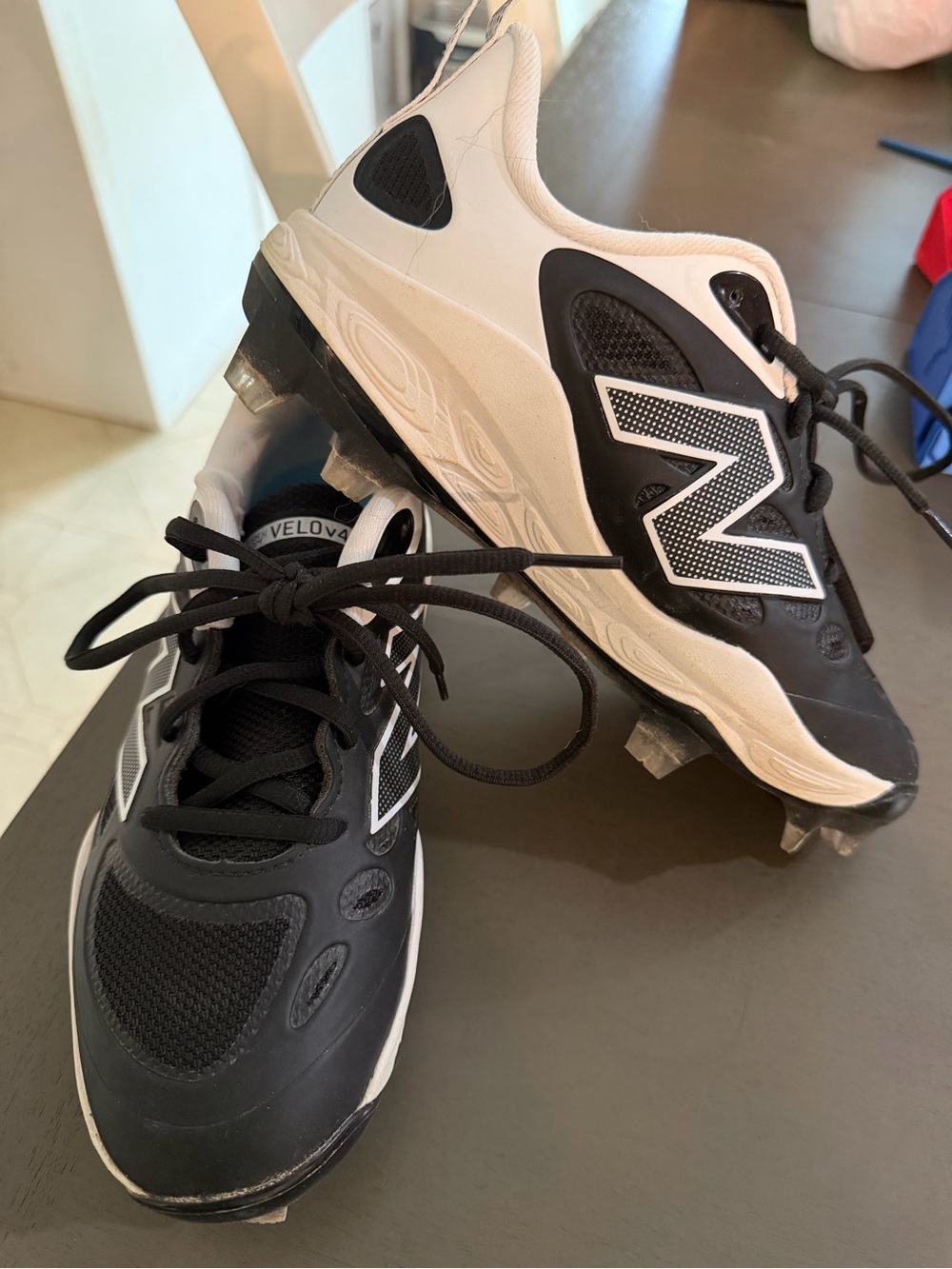New Balance Womenβs softball cleats